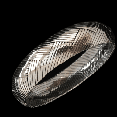 Handmade sterling silver sleek braided bangle